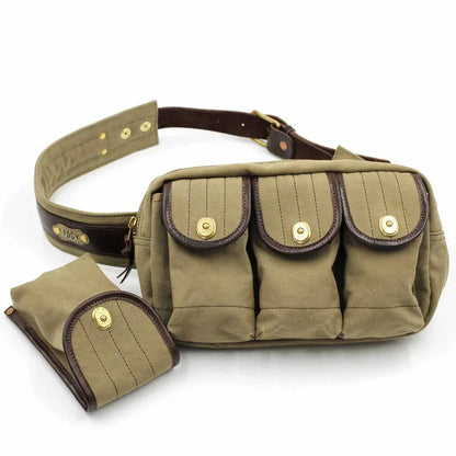 Green waist bag with multiple pockets on a white background